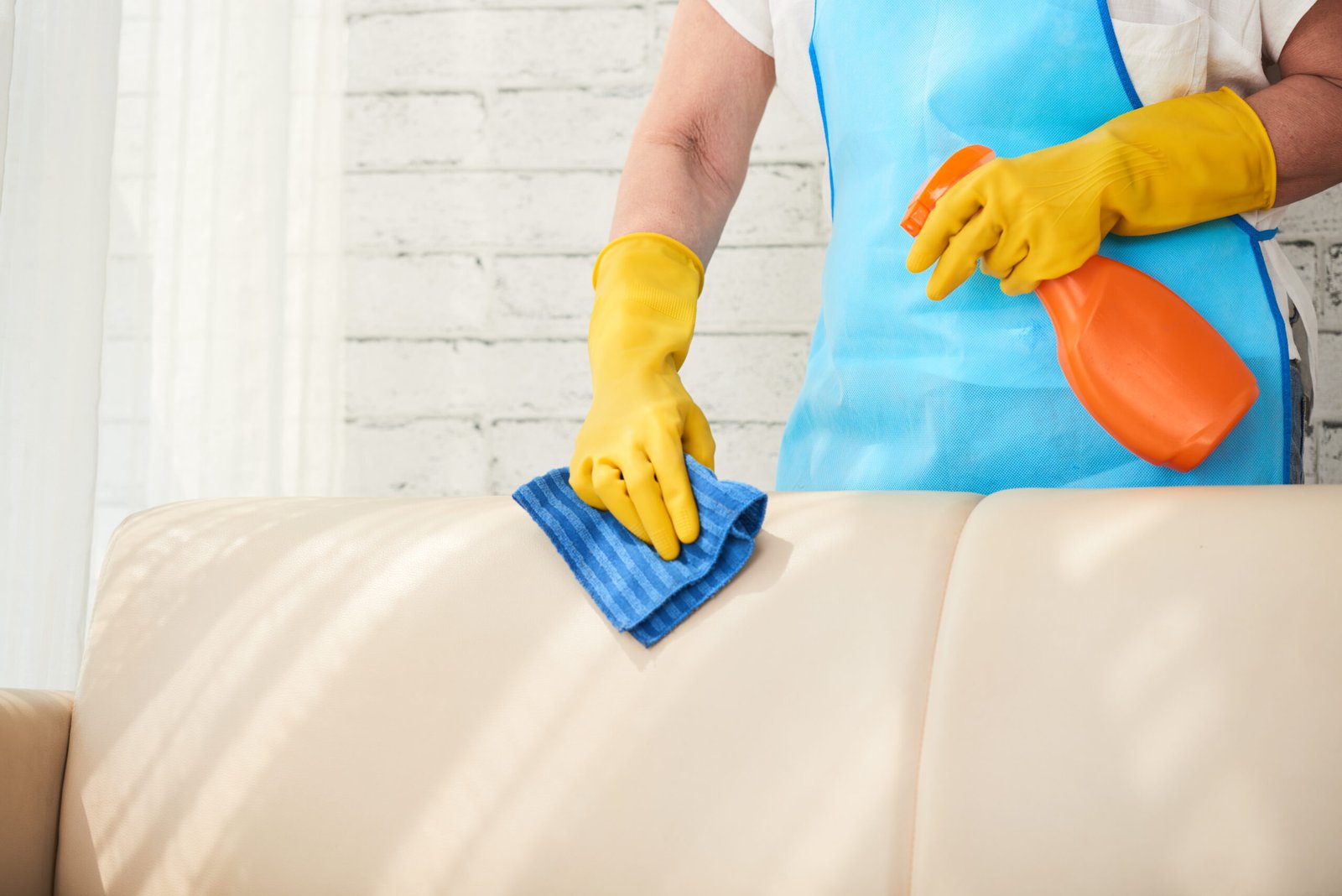 Spot clean spills on upholstered furniture to prevent permanent staining