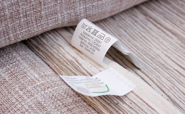Sofa fabric tag with upholstery cleaning code and information