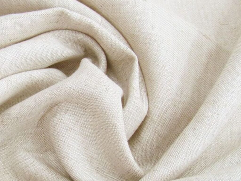Natural crumpled linen fabric in neutral color